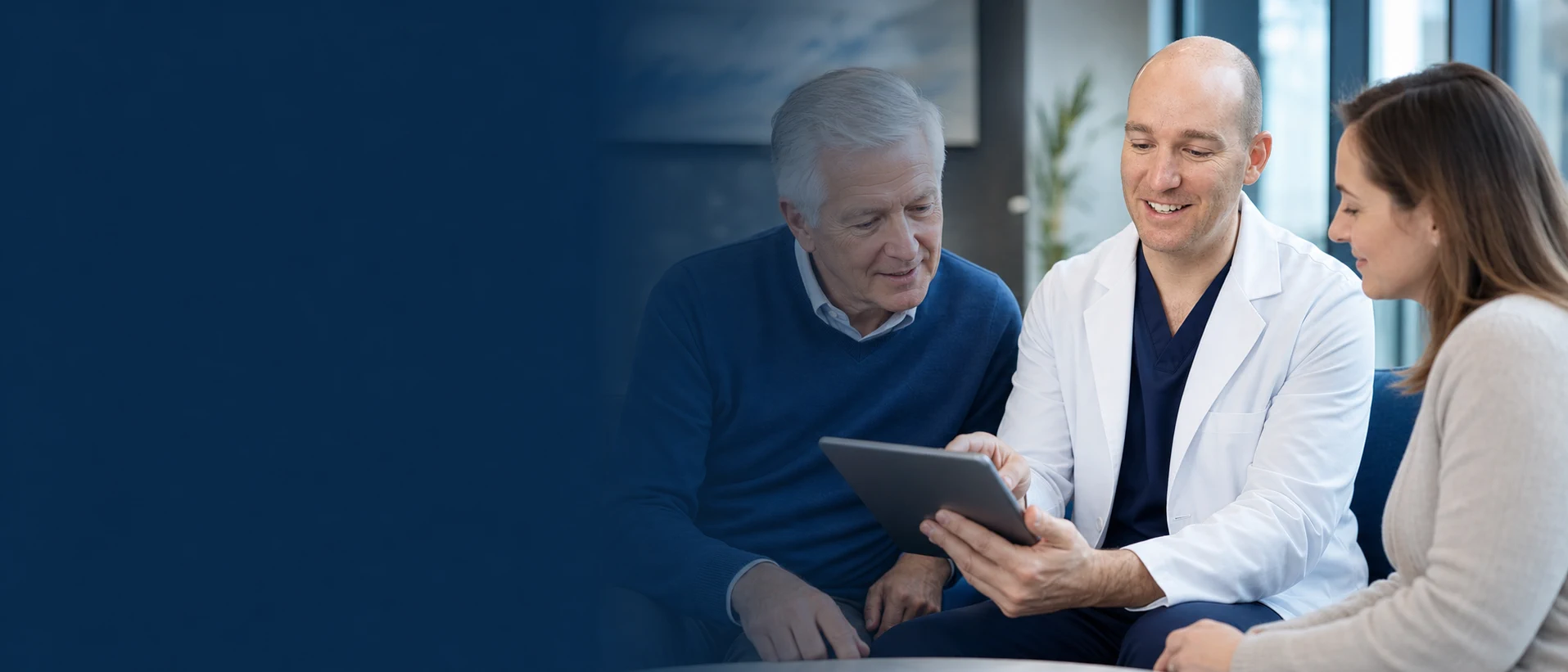 Andrew Schroeder reviewing preparation guidance with a patient and a family member